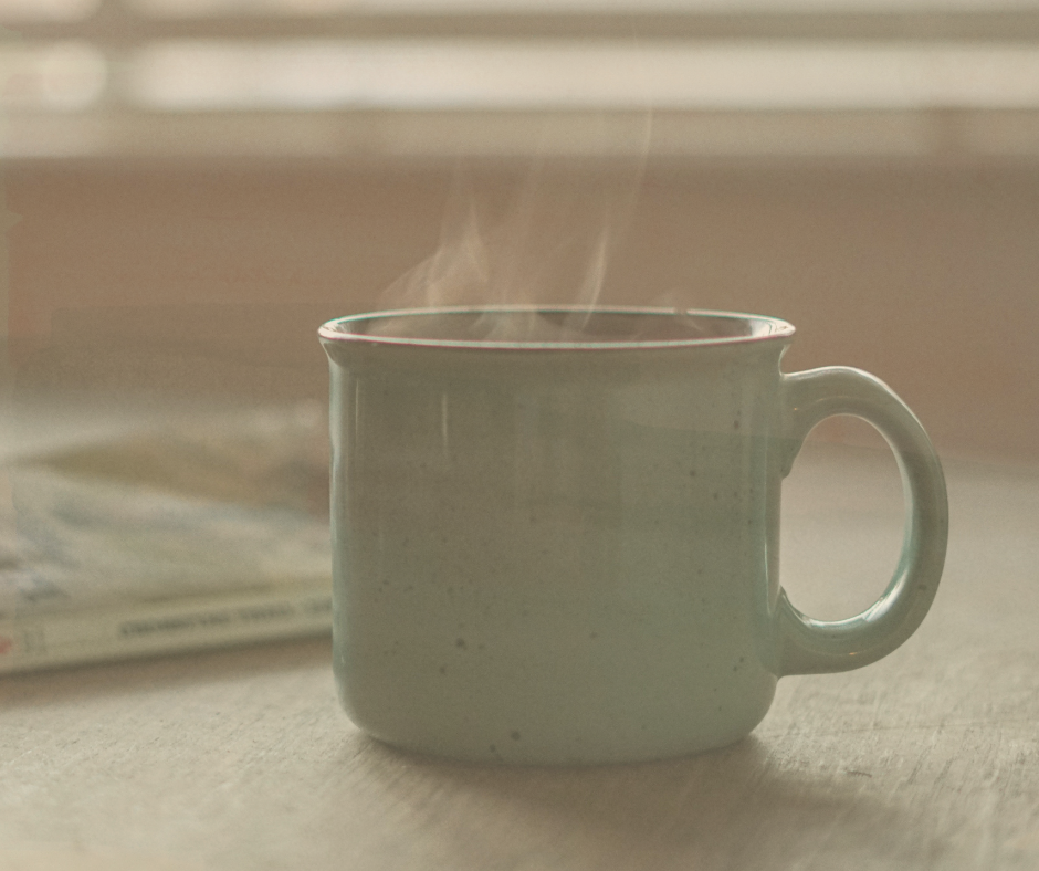 Steaming mug on a table symbolising everyday moments and reflection, representing what ageing taught me about living.